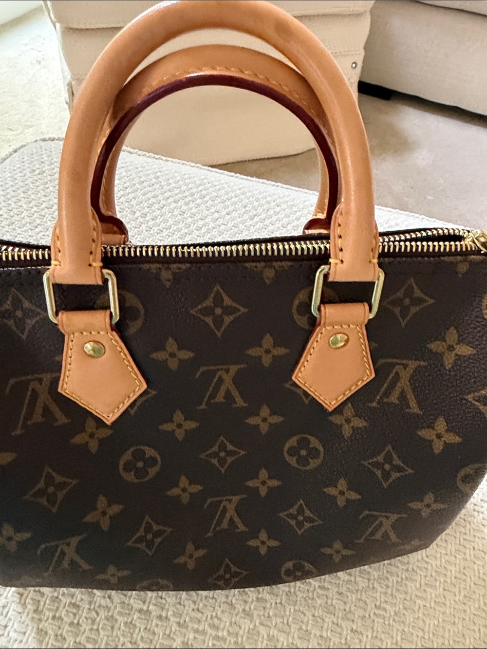 Louis Vuitton Brown Monogram Canvas Speedy 25 with tan handles. - Picture 11 of 15